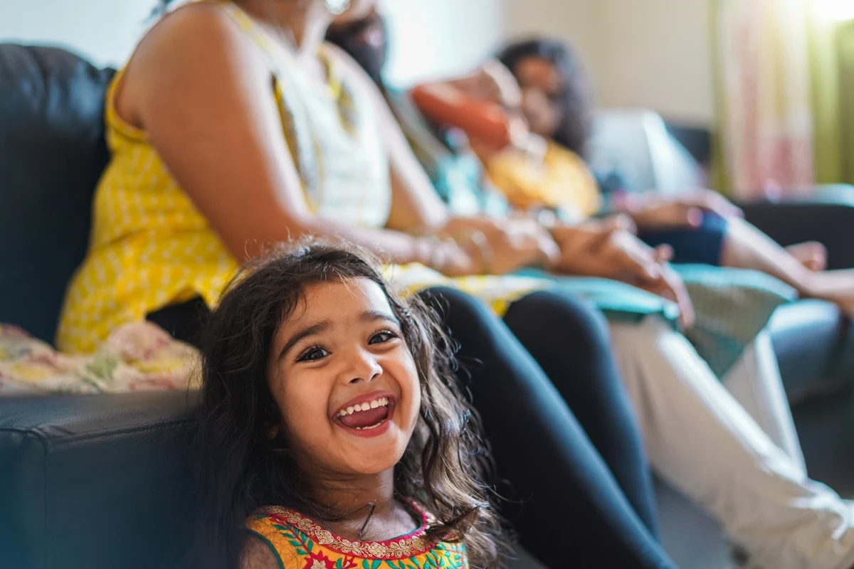 A happy child spending time with family